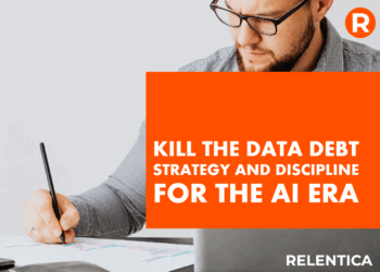 Blog - Kill the Data Debt. Man with laptop and pen